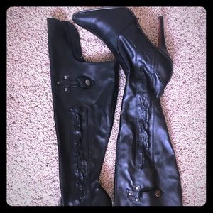 Black knee high women’s heeled boots